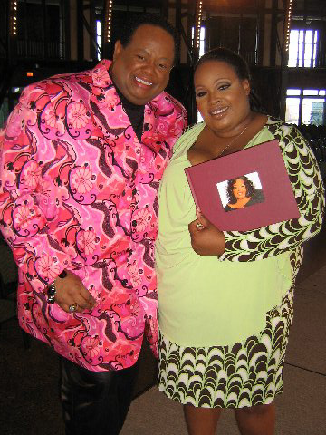 Harvey Star and Julia Hudson, sister of Jennifer Hudson, posing at Bedazzled Show - Chicago